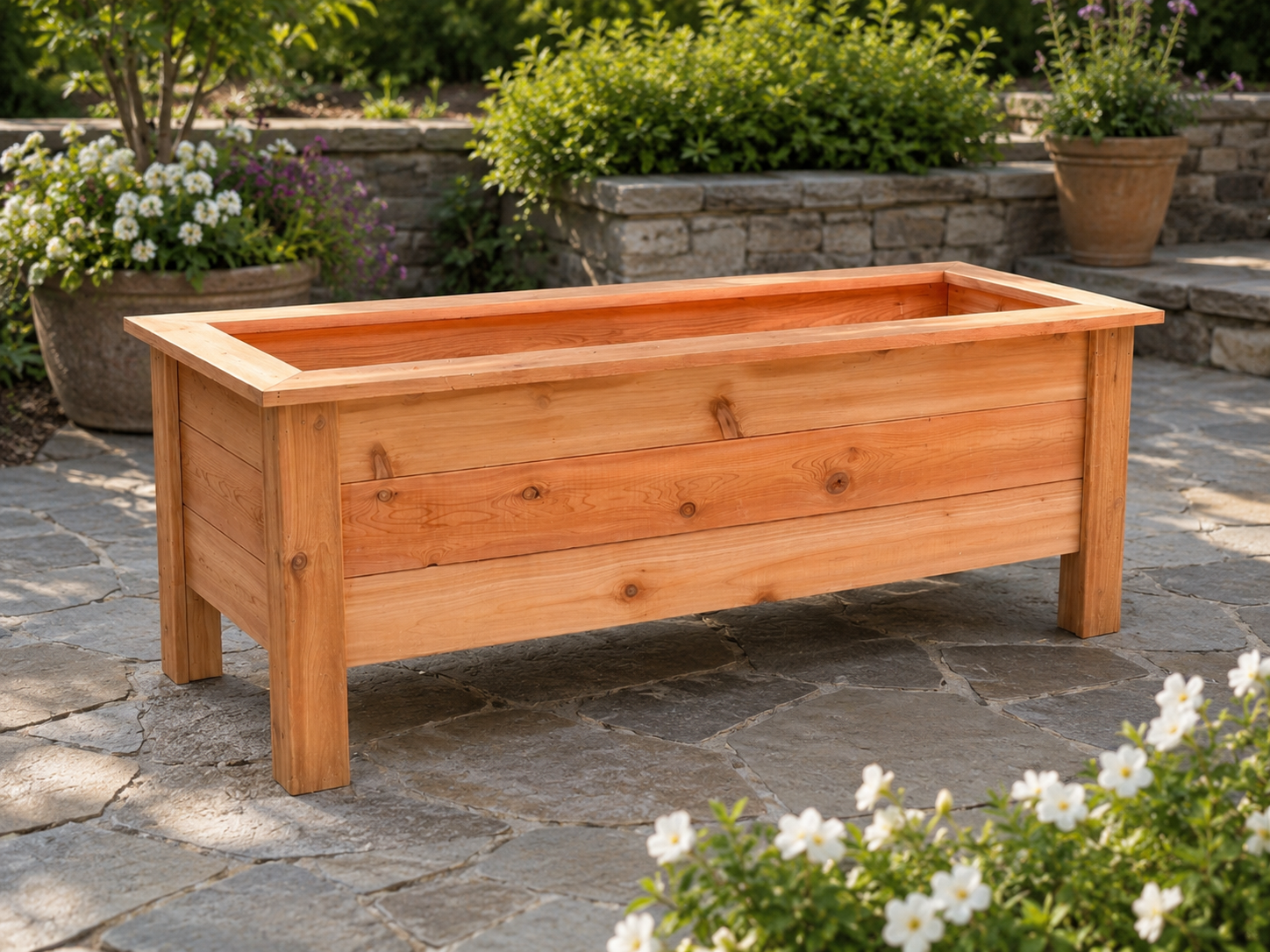 Row of large cedar planters lining a restaurant patio